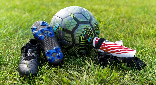 soccer cleats on green grass